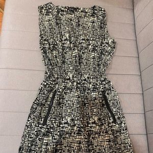 Black and off-white patterned dress with pockets